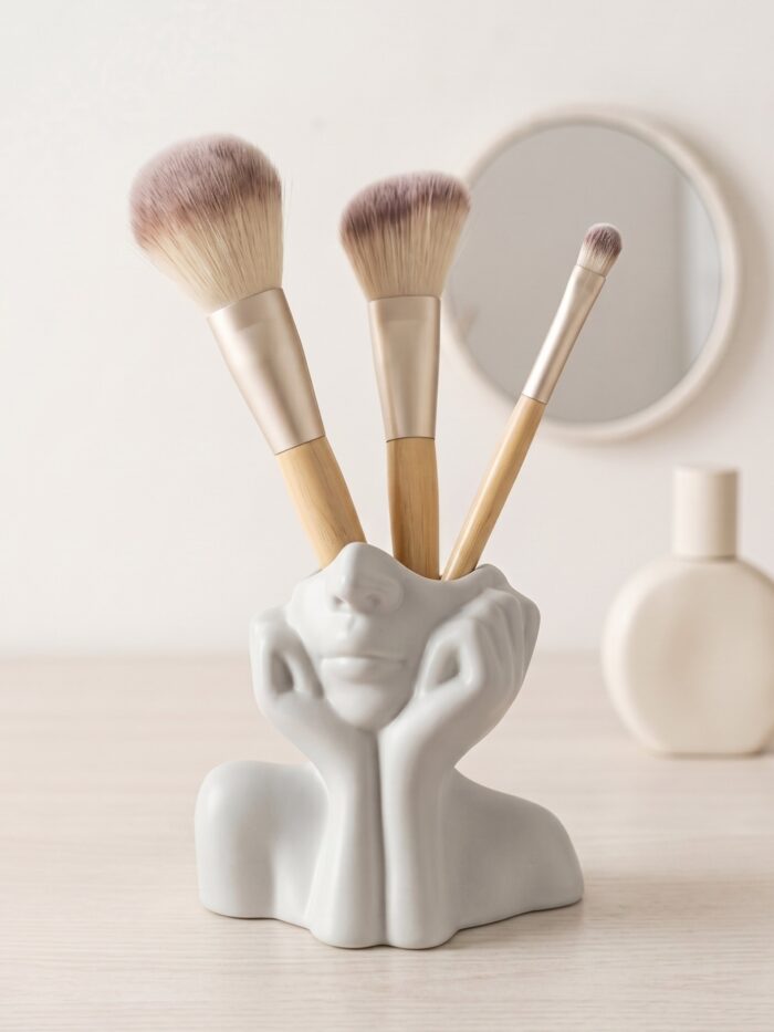 BASE DECORATIVA ROSTRO ESCULTURAL